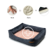 Ein plüschiges Haustierbett mit einem dunkelgrauen Äußeren und einem weichen rosa Inneren, das einen Handabdruck und ein Pluszeichen-Symbol zeigt, was Komfort und Unterstützung anzeigt.
