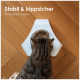 Eine getigerte Katze frisst aus einer modernen erhöhten Futterschüssel auf einem Holzboden, mit dem Text darunter: "Erhöhtes Fressen rücken schonend & weniger Schlingen."