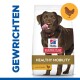 Hill's Science Plan hondenvoerzak met het label 'Gezonde Mobiliteit' met kip, met een bruine hond en de tekst 'Gewrichten.'