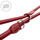 Rote Hundeleine aus Leder mit silbernen Ringen und kontrastierendem weißen Nähten, mit einem Etikett 'LIMITED EDITION'.