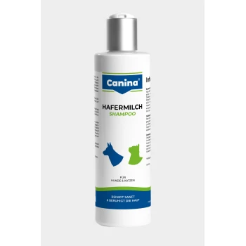 Weiße Flasche mit der Aufschrift Canina HAFERMILCH SHAMPOO für Hunde & Katzen, blaue und grüne Hunde- und Katzen-Icons, Text: Reinigt sanft & beruhigt die Haut