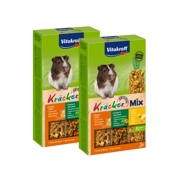 Zwei Boxen Vitakraft Kräcker Mix für Meerschweinchen, die ein Meerschweinchen und bunte Zutaten mit "Honig & Dinkel" und "Vitamine & Mineralien" zeigen.