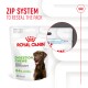 Royal Canin Digestion Chews for adult dogs, featuring a brown dog on the package, with a zip system for resealing. 84% owner satisfaction.