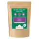 Natürliches Anti-Stress-Pulver für Hunde in einem wiederverschließbaren Beutel, mit grünem und lila Design und Text auf Deutsch: 'RUHE & RELAX PULVER'.