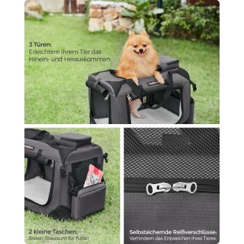 Ein flauschiger Pomeranian schaut aus einer schwarzen Tragetasche mit drei Türen, die auf grünem Gras steht, mit Seitentaschen und selbstverriegelnden Reißverschlüssen.