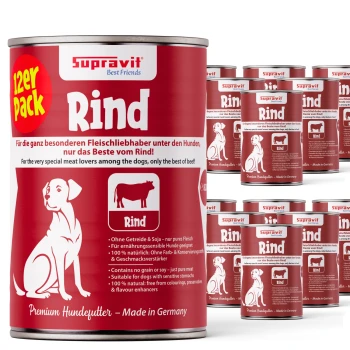 Rot-weiße Dosen von Supravit Rind Premium-Hundefutter mit Hund- und Kuh-Illustration, deutschem und englischem Text.
