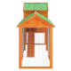 Holzhaustierhaus mit grünem Dach und Drahtgitterfront, mit einem offenen Innenraum und einer Holzplattform im Inneren.