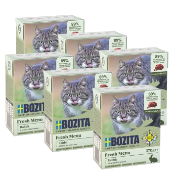 Sechs Boxen Bozita Fresh Menu Katzenfutter in Kaninchen-Geschmack, mit einer Katze, die sich auf der Verpackung die Lippen leckt, mit 89% Zutaten tierischen Ursprungs.
