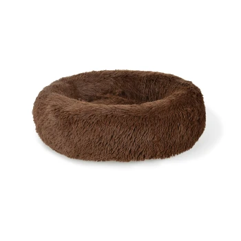 Rond, fluffy bruin huisdierbed met een zachte textuur, ontworpen voor comfort en ontspanning.