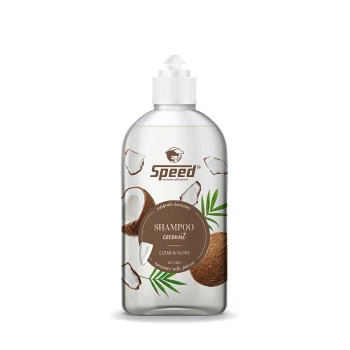 Klarer Flasche mit Speed Kokosnuss Shampoo, mit einem Etikett, das Kokosnussstücke zeigt, mit den Aufschriften "SHAMPOO Kokosnuss" und "REINIGEN & GLÄNZEN".
