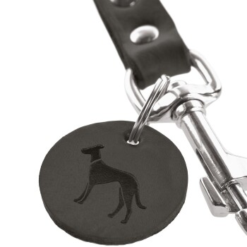 Schwarzes Leder-Hundemarke mit einer geprägten Silhouette eines Hundes, befestigt an einem silbernen Metallclip.