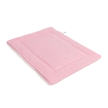 Weiches rosa Haustierbett mit gerippter Textur, das für Komfort und Stil entworfen wurde.
