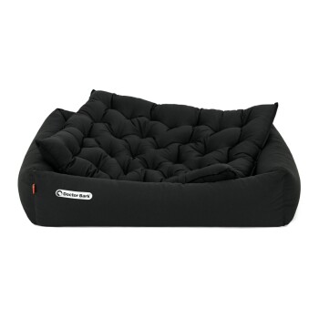 Schwarzes Haustierbett mit gepolstertem Design und einem Logoetikett mit der Aufschrift "Doctor Bark."