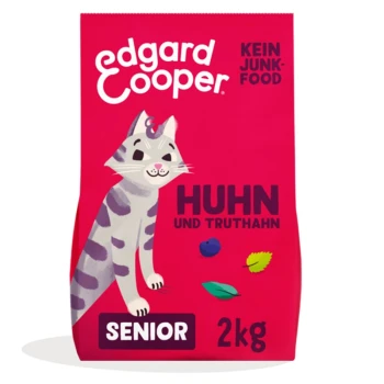 Katzenfutterbeutel mit einer Cartoon-Katze, beschriftet mit "Edgard Cooper", mit dem Text "Huhn und Truthahn", "Senior" und "2kg" auf einem rosa Hintergrund.