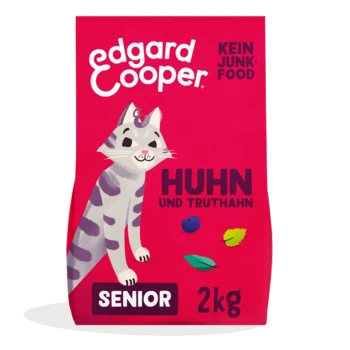 Katzenfutterbeutel mit einer Cartoon-Katze, beschriftet mit "Edgard Cooper", mit dem Text "Huhn und Truthahn", "Senior" und "2kg" auf einem rosa Hintergrund.