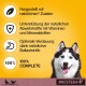 Hundefutteranzeige auf gelbem Hintergrund, die natürliche Zutaten, Immununterstützung, optimale Verdauung und 100% vollständige Ernährung präsentiert.