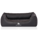 Schwarzes Hundebett mit einem gesteppten Design und einer erhöhten Rückenlehne, mit dem Logo "KNUFFELWUFFF" auf der Vorderseite.