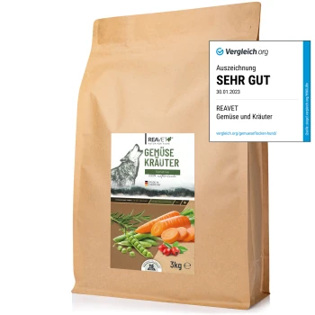 Braune Papiertüte mit REAVET Gemüse- und Kräutermischung für Haustiere, 3 kg, mit einem Wolf-Grafik und dem 'SEHR GUT'-Auszeichnungsetikett.