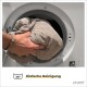 Eine Hand, die eine große, zerknitterte graue Decke in eine Waschmaschine legt, mit dem Text 'Einfach Reinigung' und einem Waschsymbol, das 30°C anzeigt.