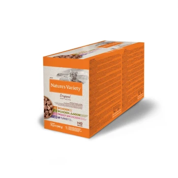 Boîte de nourriture pour animaux Nature's Variety présentant des saveurs : poulet, oie, bœuf et dinde. Comprend une étiquette "Sans Céréales" et des détails nutritionnels.