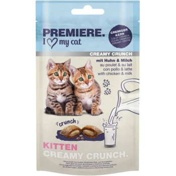 Two playful kittens on a pet treat package, labeled "PREMIERE. I ❤️ my cat. CREAMY CRUNCH" with flavors of chicken and milk.