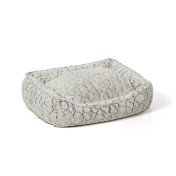 Weiches graues Haustierbett mit einer plüschigen, strukturierten Oberfläche und erhöhten Rändern, entworfen für Komfort und Unterstützung.