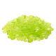 A pile of small, translucent green pet treats resembling jelly beans, set against a white background.