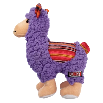 Jouet pour chien en peluche violet en forme de lama avec une selle rayée rouge et une étiquette logo KONG.