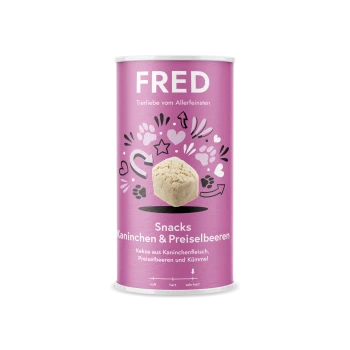 Dose mit FRED-Haustiersnacks, die ein helllila Design aufweist, beschriftet mit 'Snacks Kaninchen & Preiselbeeren', mit Illustrationen von Herzen und Pfotenabdrücken.