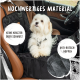 Ein kleiner Hund sitzt auf einem schwarzen, gesteppten Autositzbezug, der "Hochwertiges Material", "Keine Kratzer" und "Rutschfeste Noppen" zeigt.