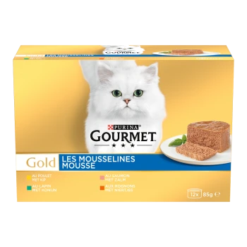 Purina Gourmet Gold kattenvoedseldoos met een witte langharige kat, een bord met moussepaté; etiket 'Les Mousselines Mousse' en '12x 85g'.