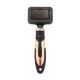 Eine Haustierpflegebürste mit rechteckigem Kopf und feinen Borsten, einem ergonomischen Griff in Schwarz und Roségold, ideal zum Entfernen von losem Fell.