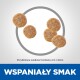 Obrazek kawałków karmy dla zwierząt, o wymiarach około 4,5 x 9 mm, z wyraźnym napisem "WSPANIAŁY SMAK".
