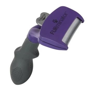 FURminator de-shedding tool with a purple head and ergonomic gray handle, designed for removing loose pet hair.