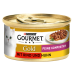 Une boîte de nourriture pour chats Purina Gourmet Gold avec un chat blanc sur l'étiquette, avec le texte 'Mit Rind und Huhn' et 'Feine Komposition.'