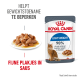 Royal Canin Light Weight kattenvoer zakje met natvoer en een kat. Tekst: "Helpt gewichtstoename te beperken" en "Fijne plakjes in saus."