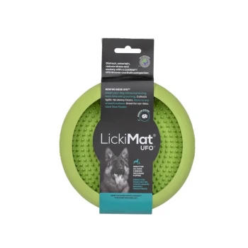 Grüne LickiMat UFO Haustierfütterungsmatte mit strukturierter Oberfläche, entworfen, um Hunde während der Pflege abzulenken; zeigt ein Hundebild und Produktdetails.