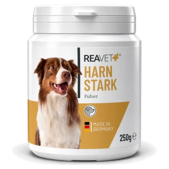 Behälter mit REAVET HARN STARK Pulver für Hunde, mit einem lächelnden Hund auf dem Etikett, mit dem Text "Hergestellt in Deutschland" und 250g.