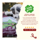 Ein Hund inspiziert einen Sack "Irish Pure" Hundefutter mit grünem Logo, Kuhbildern und einem Testimonial von Tina B. aus Mölln.