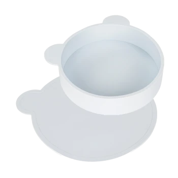 Weiße Haustierfutterschüssel mit einer bärenförmigen Matte darunter, mit einem glatten, runden Design und abgerundeten Ohren an der Schüssel.