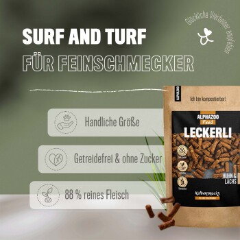 Tierleckerliverpackung mit "Surf and Turf für Feinschmecker", die 88 % Fleischanteil, getreidefrei und zuckerfrei hervorhebt.