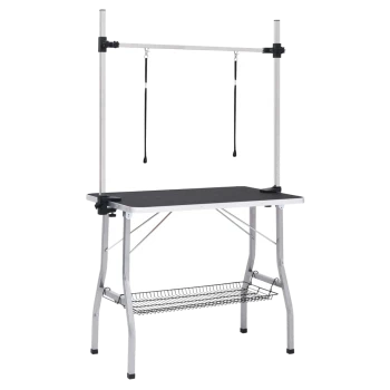 Haustierpflege-Tisch mit verstellbarem Arm und zwei Pflege-Schlaufen, mit einer stabilen schwarzen Oberfläche und einem Drahtregal darunter.