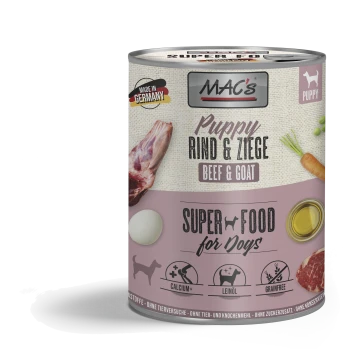 Dosenhundefutter "MAC's Puppy Rind & Ziege" mit Fleisch, Ei und Gemüse; beschriftet mit "Super Food für Hunde," "Calcium+," "Leinöl," und "Getreidefrei."