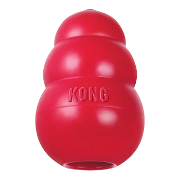Jouet KONG classique en caoutchouc rouge pour chien, forme à trois niveaux avec ouverture inférieure et logo KONG embossé