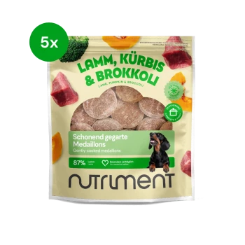 Packung Nutriment Hundeleckerli mit Lamm, Kürbis und Brokkoli, mit einem Dackel und wichtigen Produktdetails.