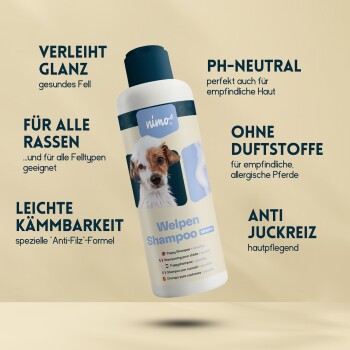 Helle blaue Welpenshampoo-Flasche mit deutschen Etiketten: "Verleiht Glanz", "PH-Neutral", "Für alle Rassen", "Ohne Duftstoffe."