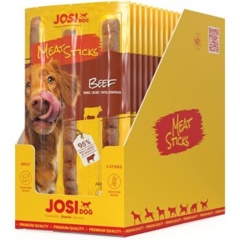 Verpackung für Hundeleckerlis mit Rindfleisch-Sticks, mit einem golden Retriever, der sich die Lippen leckt, beschriftet 'JOSI DOG Fleischsticks Rind'.