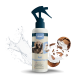 Eine Flasche nimo! Fellpflege-Spray mit einer blauen Düse, mit einem Welpenbild und Kokosstücken, umgeben von Wasserspritzern.
