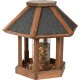 Houten vogelvoederhuis met een hexagonale vorm, voorzien van een zwart shingles dak en een transparant midden gevuld met vogelzaad.