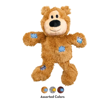 Brown plush bear dog toy with blue patches and stitched face; 'Assorted Colors' text below.
